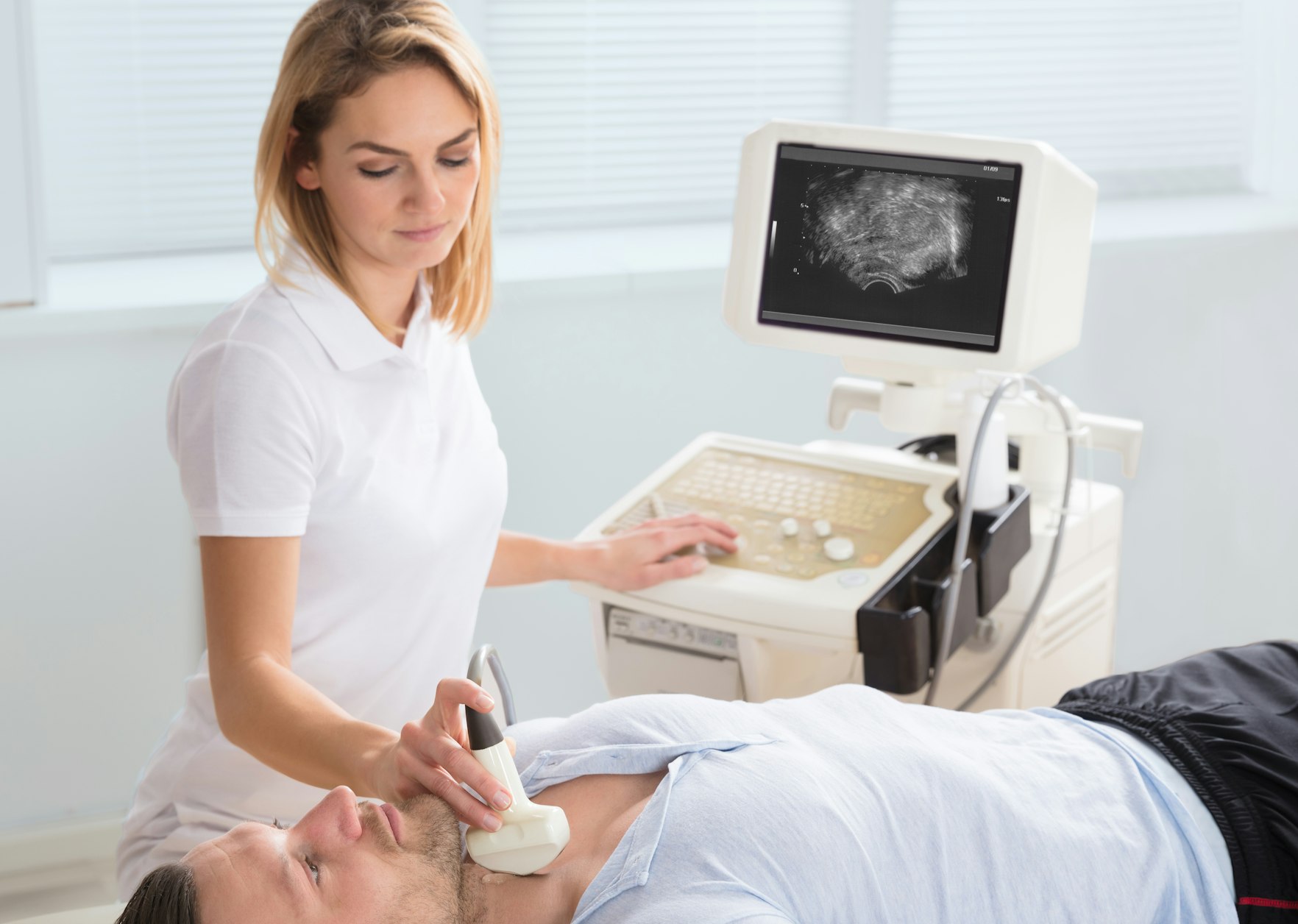 Technician w patient ultrasound Depositphotos 150517578 xl 2015